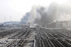 В Китае в результате взрывов сгорело почти десять тысяч новых машин